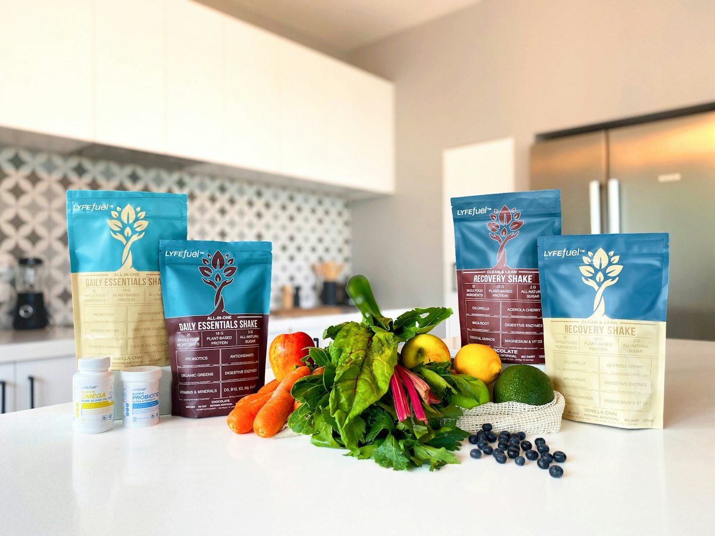 LYFEfuel products and fresh produce on a white kitchen counter.